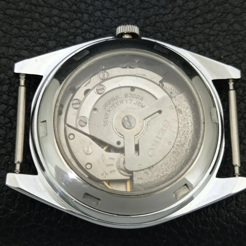 Vintage 1973 Seiko Automatic Mens Silver Watch W/daydate & Arabic accents